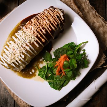 La Palapa signature dishes Enchiladas Verdes Y MoleSpecialty BurritoEmpanada